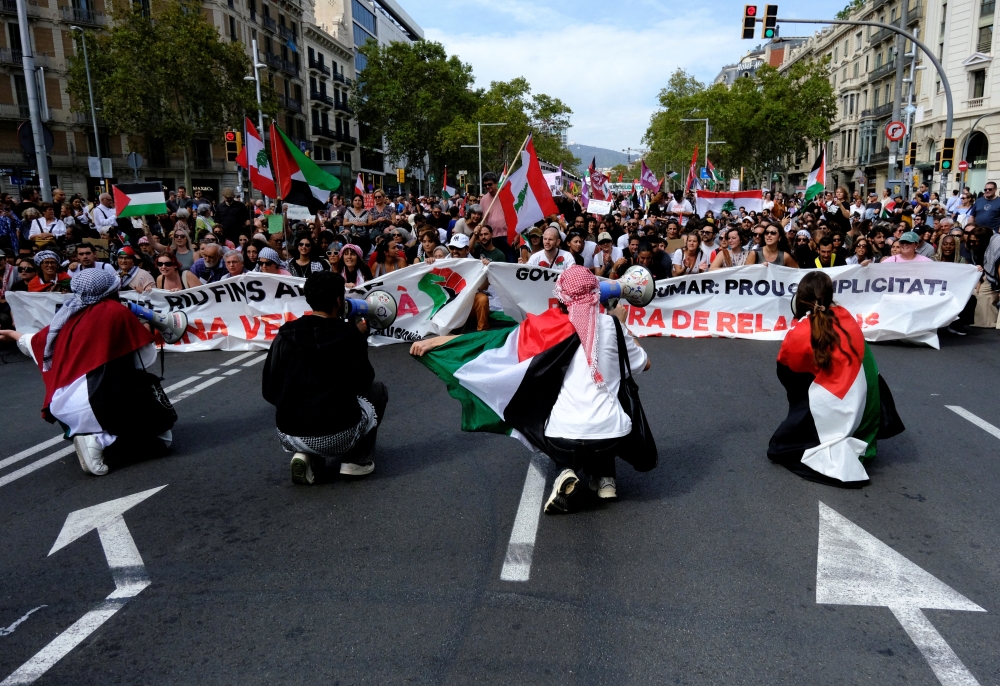 People demonstrate during a protest to express support for Palestinians in Gaza, in Barcelona. — Reuters 