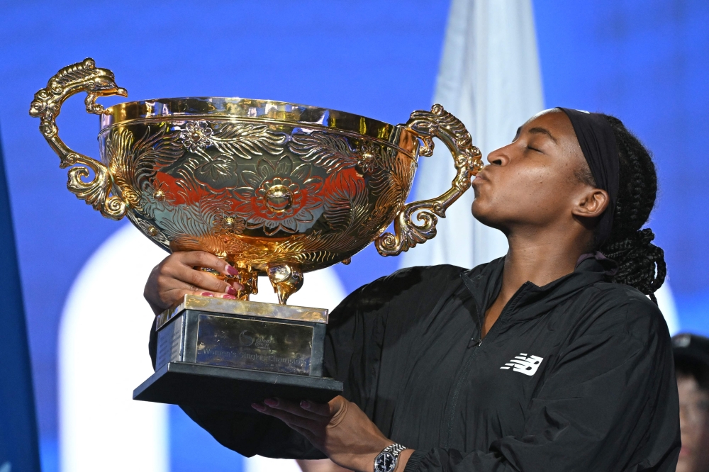 USA's Coco Gauff celebrates with the trophy. — AFP