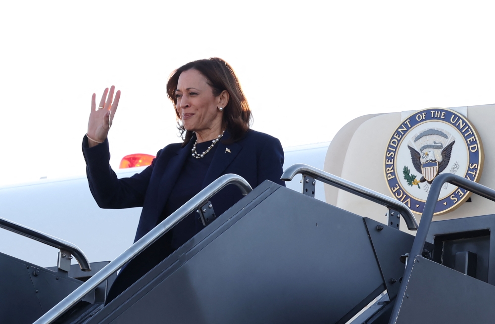 US Vice President and Democratic presidential candidate Kamala Harris waves as she arrives in Las Vegas, Nevada. - AFP