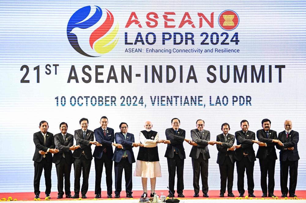 Myanmar's Permanent Secretary of Foreign Affairs Aung Kyaw Moe, Philippines' President Ferdinand Marcos Jr, Singapore's Prime Minister Lawrence Wong, Thailand's Foreign Minister Maris Sangiampongsa, Vietnam's Prime Minister Pham Minh Chinh, India's Prime Minister Narendra Modi, Laos' Prime Minister Sonexay Siphandone, Malaysia's Prime Minister Anwar Ibrahim, Brunei's Sultan Hassanal Bolkiah, Cambodia's Prime Minister Hun Mamet, Indonesia's Vice Prime Minister Ma'ruf Amin and East Timor's Prime Minister Xanana Gusmao pose at the 21th Asean-India Summit in Vientiane. - AFP

