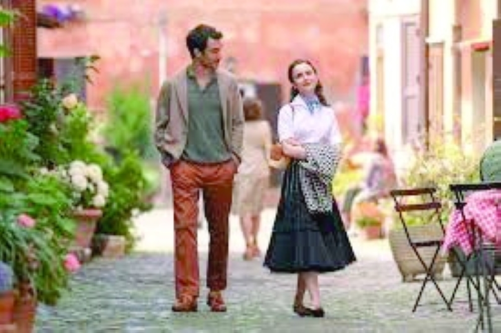 Let 'Emily in Paris' remain in Paris, Macron says