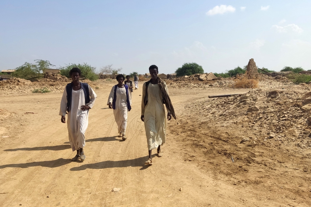 Sudanese make their way to receive a medical check-up in Tokar, in eastern Sudan. — AFP 
