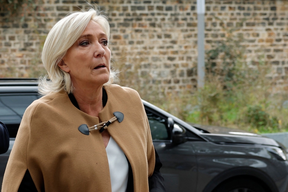 French far-right Rassemblement National (RN) Member of Parliament Marine Le Pen arrives for a trial, at a court in Paris. — AFP 