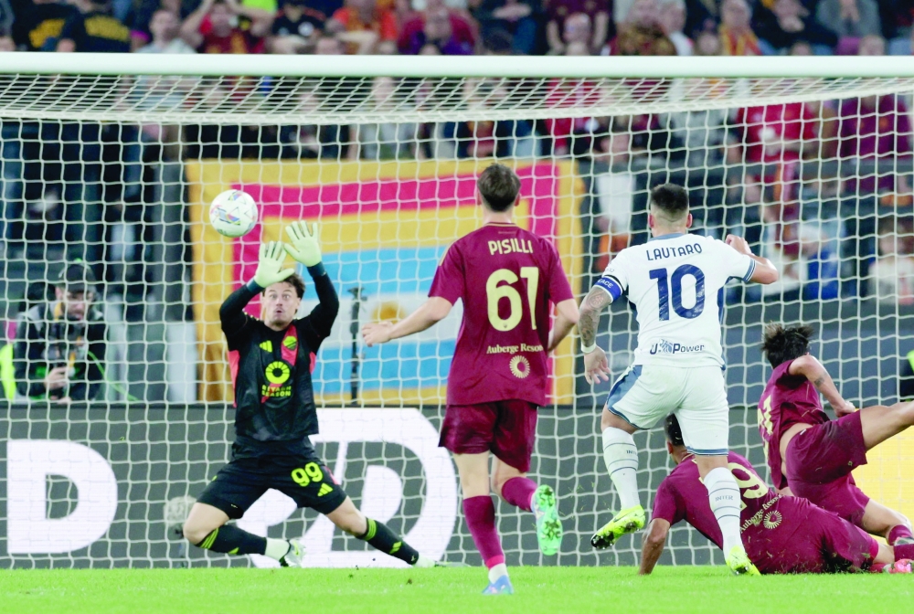 Inter Milan's Lautaro Martinez scores their first goal. — Reuters