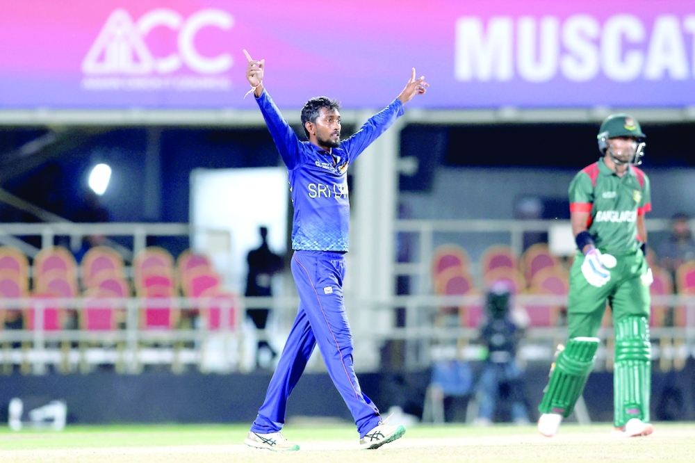 Dushan Hemantha of Sri Lanka A celebrates the wicket of Akbar Ali of Bangladesh A