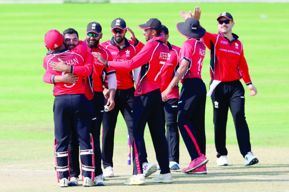 Anas Khan of Hong Kong, China celebrates the wicket of Qais Ahmad Kamawal of Afghanistan A. -- ACC 
