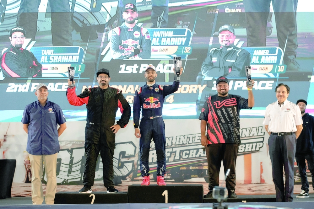 Salim al Maskari (right) during the Oman International Drift Championship prize ceremony