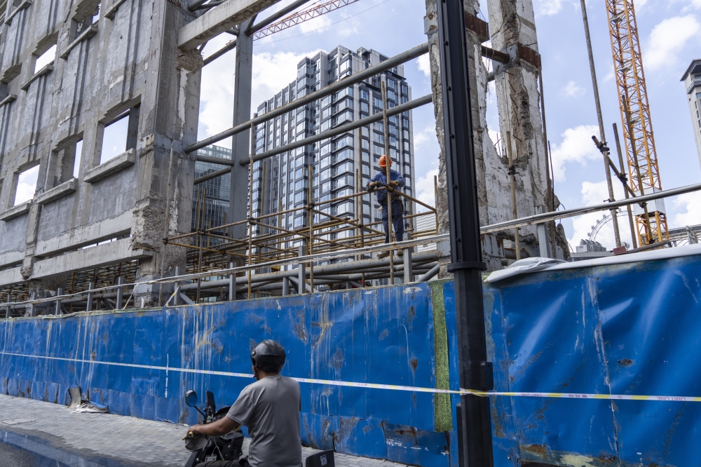 A housing development under construction in Shanghai, China. — The New York Times