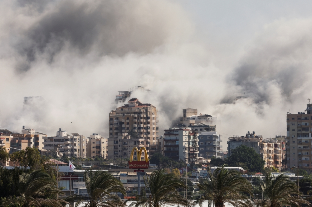 Smoke billows after an Israeli strike, in Tyre, southern Lebanon. — Reuters 