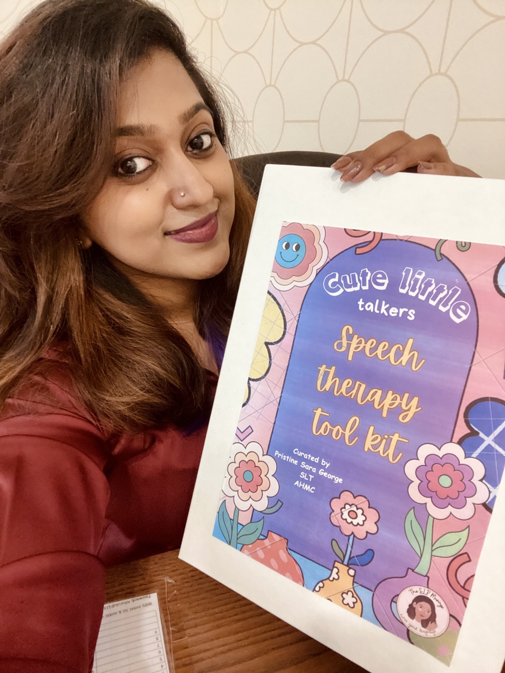 Pristine Sara George displays Speech Therapy Tool Kit
