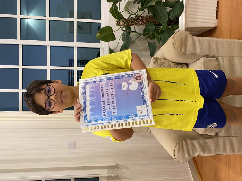 Ibrahim with Winter themed 'cute little talkers speech therapy tool kit'