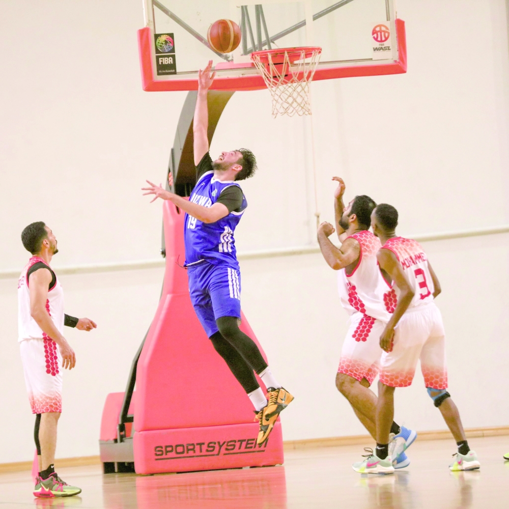 Nizwa and Dhofar players in action. -- Ameer al Hamhamy
