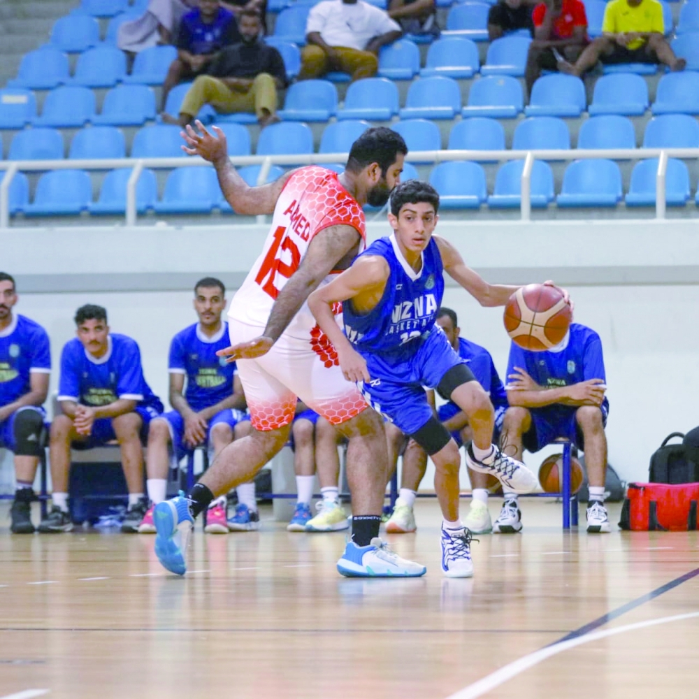 Nizwa and Dhofar players in action. -- Ameer al Hamhamy