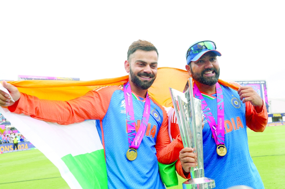 Kensington Oval, Bridgetown, Barbados - June 29, 2024 India's Virat Kohli and Rohit Sharma celebrate with the trophy after winning the T20 World Cup. — File Photo