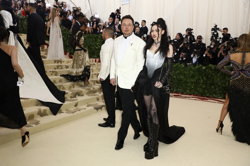 Elon Musk and Claire Boucher, the musician better known as Grimes attend at the Met Gala in New York, May 7, 2018. (Damon Winter/The New York Times)
