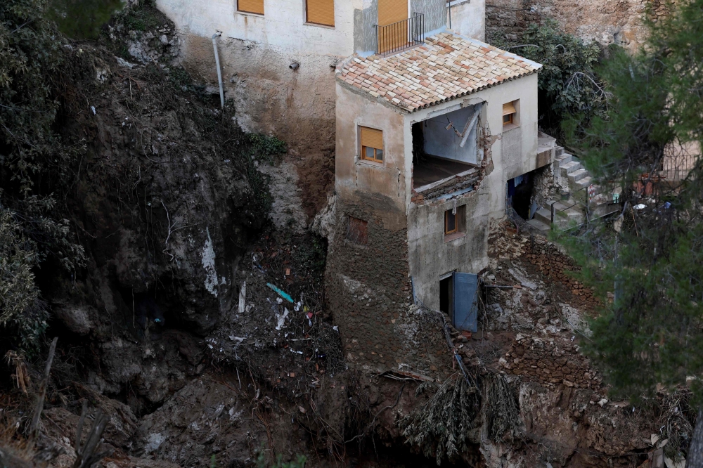 A picture taken on October 30, 2024 shows a damaged house following floods in Letur, southwest of Valencia, eastern Spain