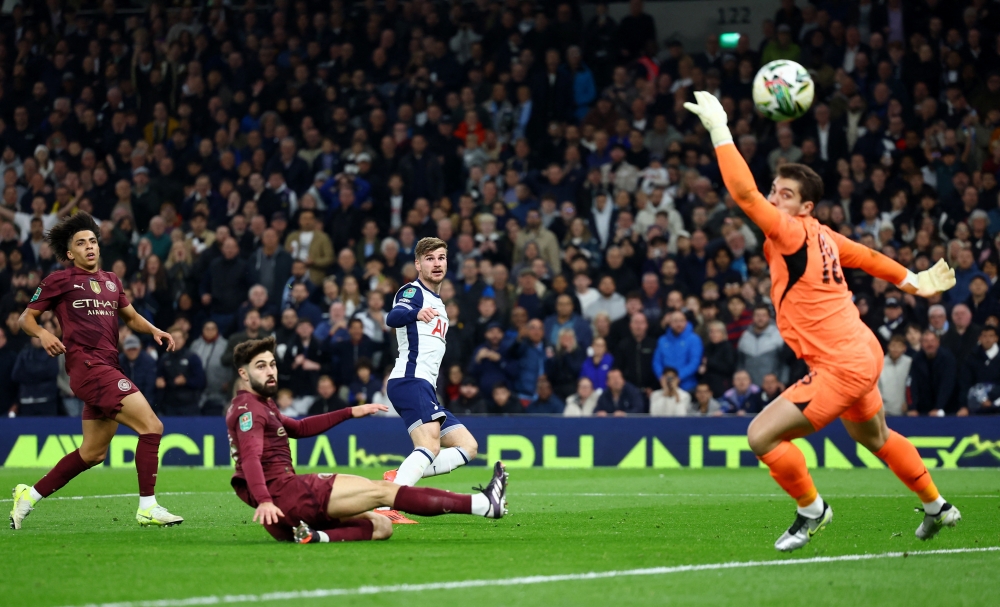 Soccer Football - Carabao Cup - Round of 16 - Tottenham Hotspur v Manchester City - Tottenham Hotspur Stadium, London, Britain - October 30, 2024  Tottenham Hotspur's Timo Werner shoots at goal Action Images via Reuters