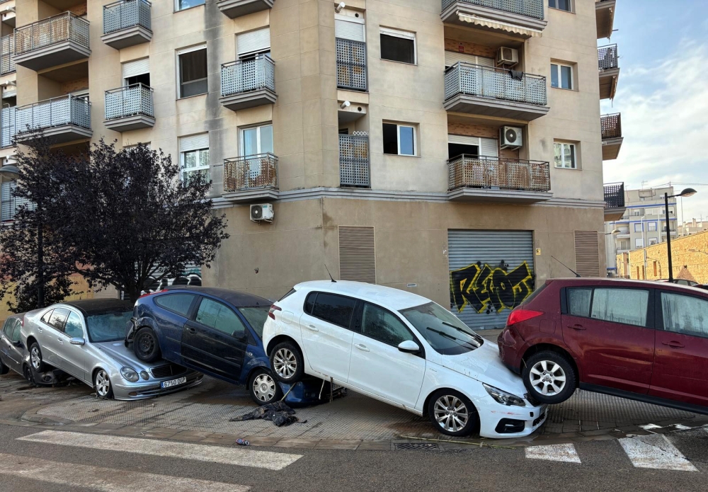 Cars are stacked in the Torre neighborhood after deadly flooding in Valencia, Spain, on Thursday, Oct. 31, 2024.(Emma Bubola/The New York Times)