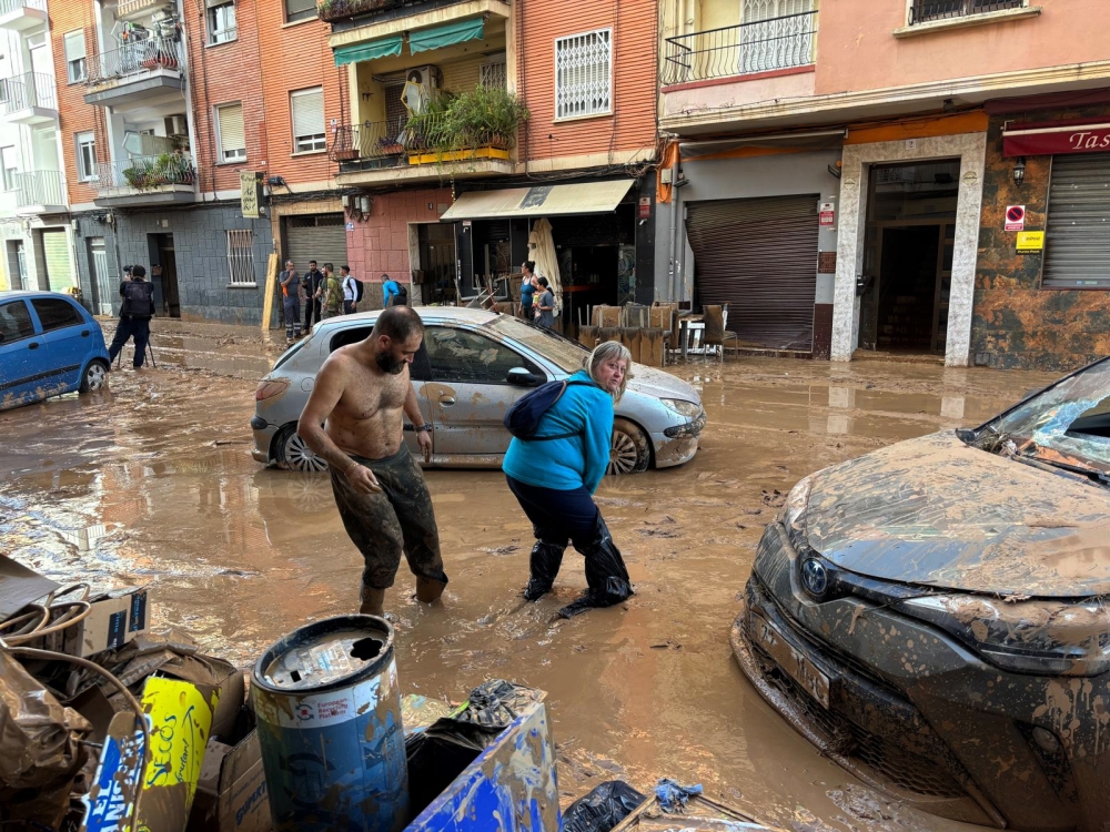 Deep mud covers streets in the Torre neighborhood after deadly flooding in Valencia, Spain, on Thursday, Oct. 31, 2024. (Emma Bubola/The New York Times)