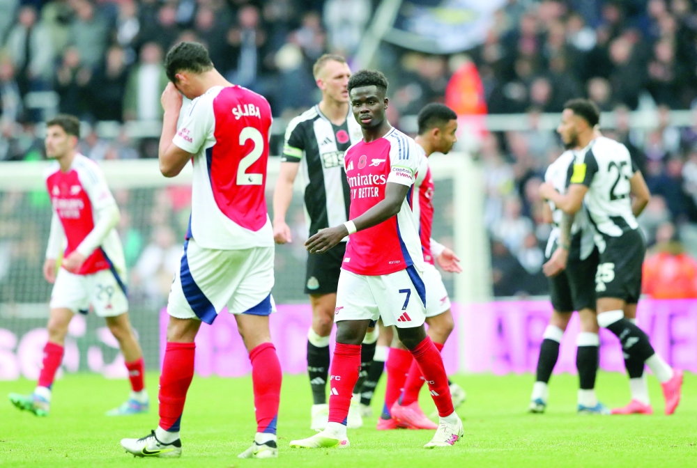 Arsenal's Bukayo Saka looks dejected. — Reuters
