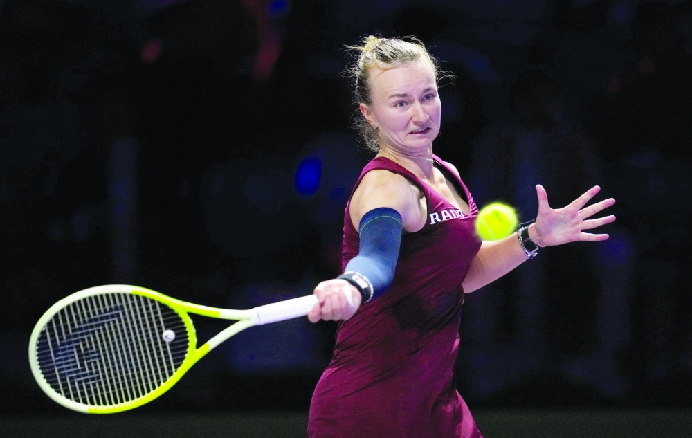 Tennis - WTA Finals - King Saud University Indoor Arena, Riyadh, Saudi Arabia - November 5, 2024 Czech Republic's Barbora Krejcikova in action during her women's singles group stage match against Jessica Pegula of the U.S. REUTERS
