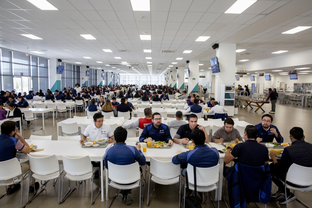 Workers in the main cafeteria at the BMW factory near San Luis Potosí, Mexico, Oct. 29, 2024. (Benedicte Desrus/The New York Times)