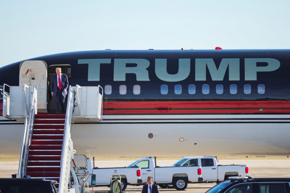 Donald Trump arrives prior to meeting with President Joe Biden and members of Congress in Washington, at Joint Base Andrews on Wednesday.