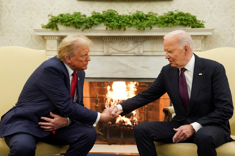US President Joe Biden meets with President-elect Donald Trump in the Oval Office at the White House in Washington on Wednesday. — Reuters