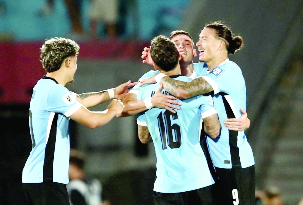 Ugarte celebrates scoring third goal with team-mates. — Reuters