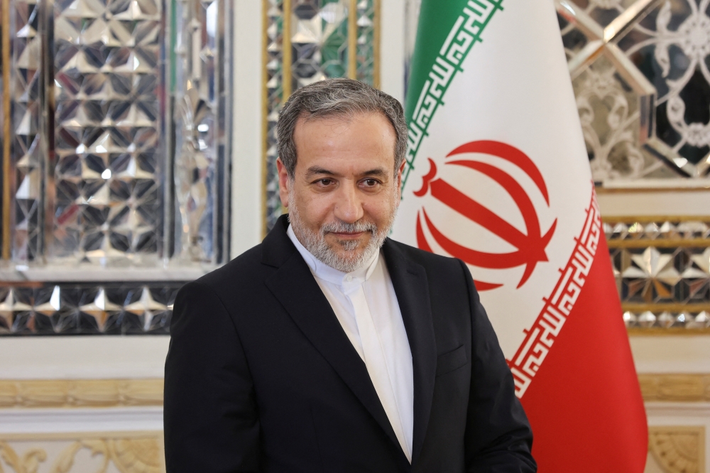 Iranian Foreign Minister Abbas Araghchi looks on before a meeting with Qatari Prime Minister