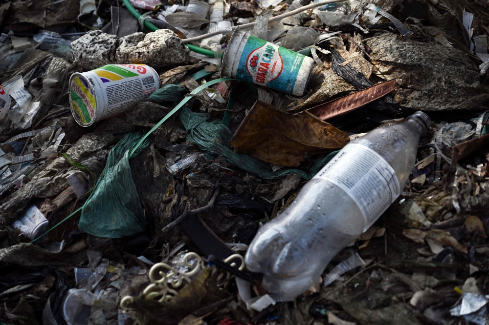 Plastic waste and garbage are seen at Guanabara Bay on a shore in Rio de Janeiro, 