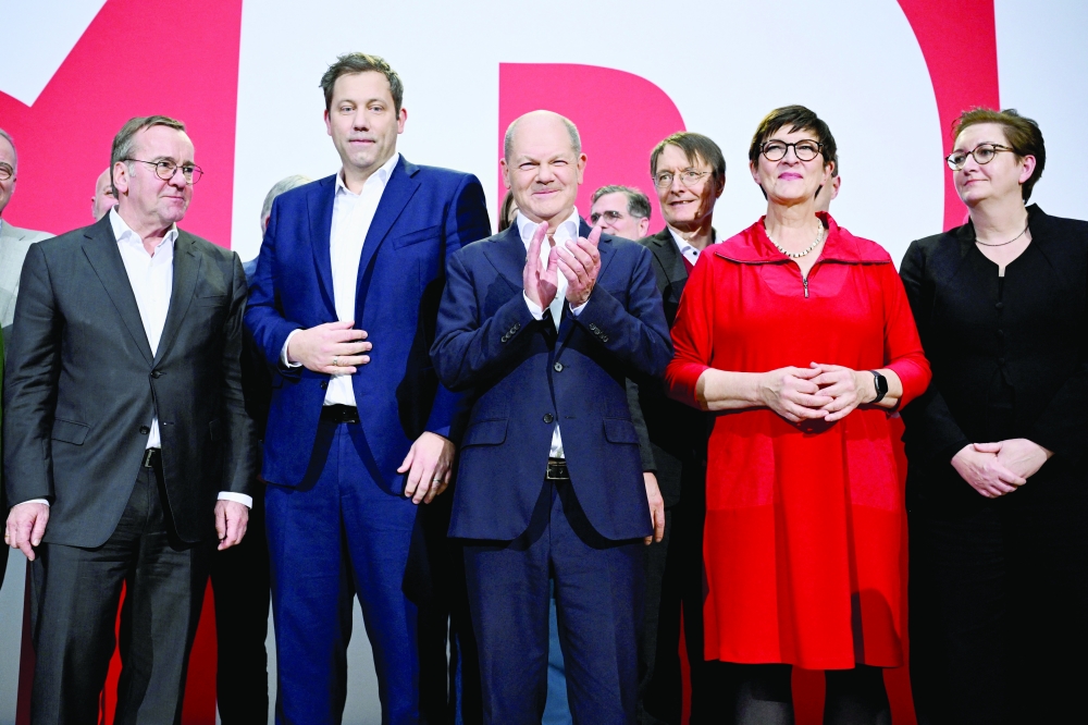 German Chancellor Olaf Scholz (C) reacts as he is the officially nominated candidate for the upcoming general elections, in Berlin. — Reuters 