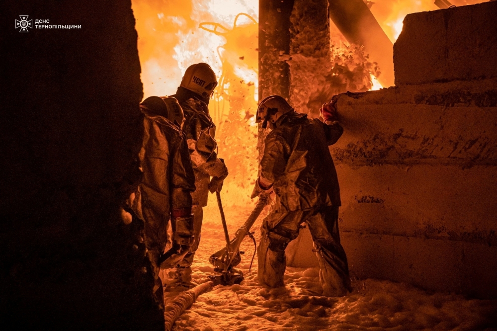 Rescuers work at the site of a Russian drone strike, in Ternopil, Ukraine. — Reuters 