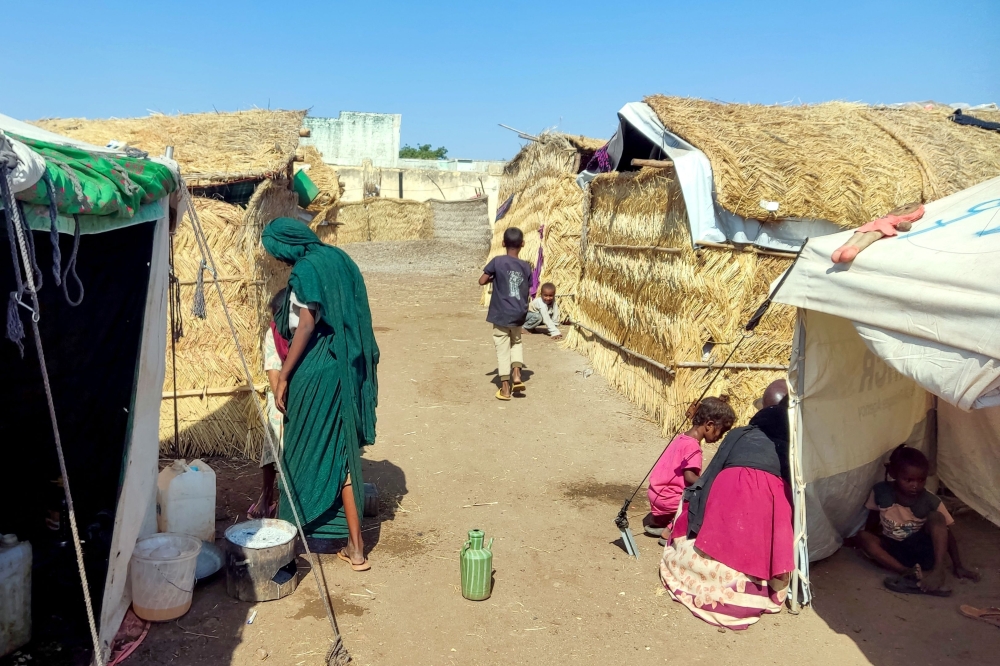Sudanese people who fled escalating violence rest at a camp for the displaced in the eastern city of Gedaref. — AFP 
