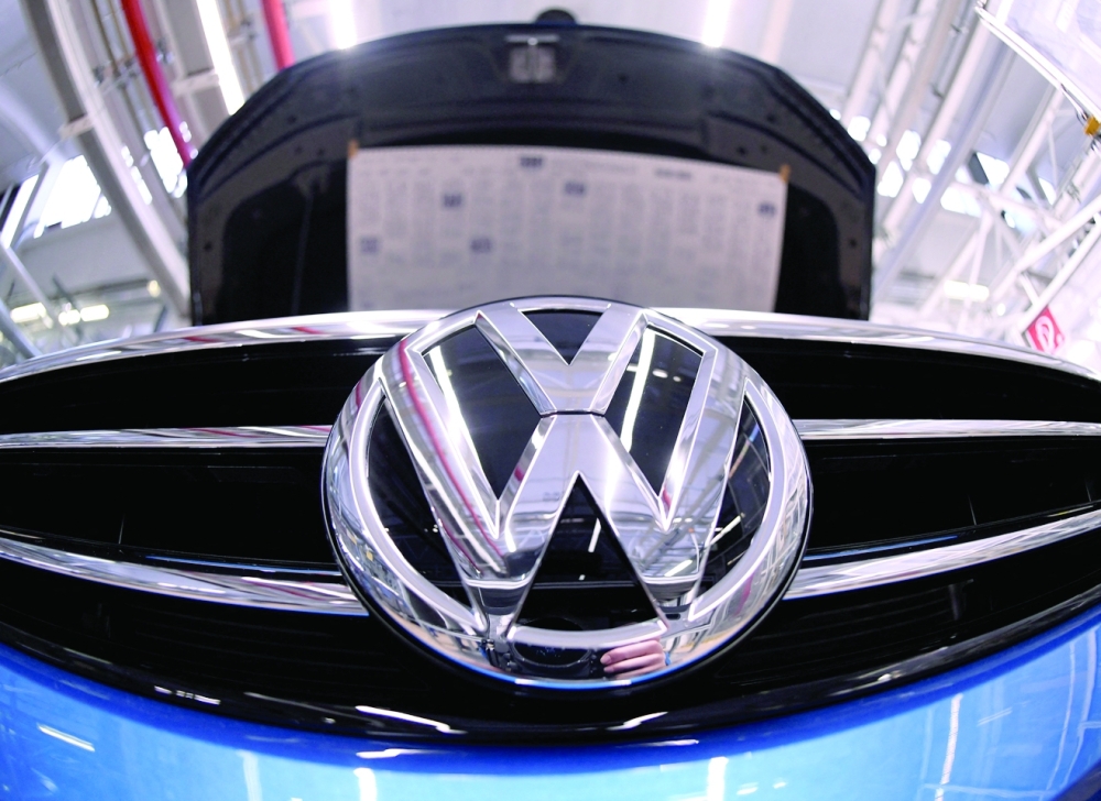 A Volkswagen logo is pictured in a production line at the Volkswagen plant in Wolfsburg, Germany. - Reuters File
