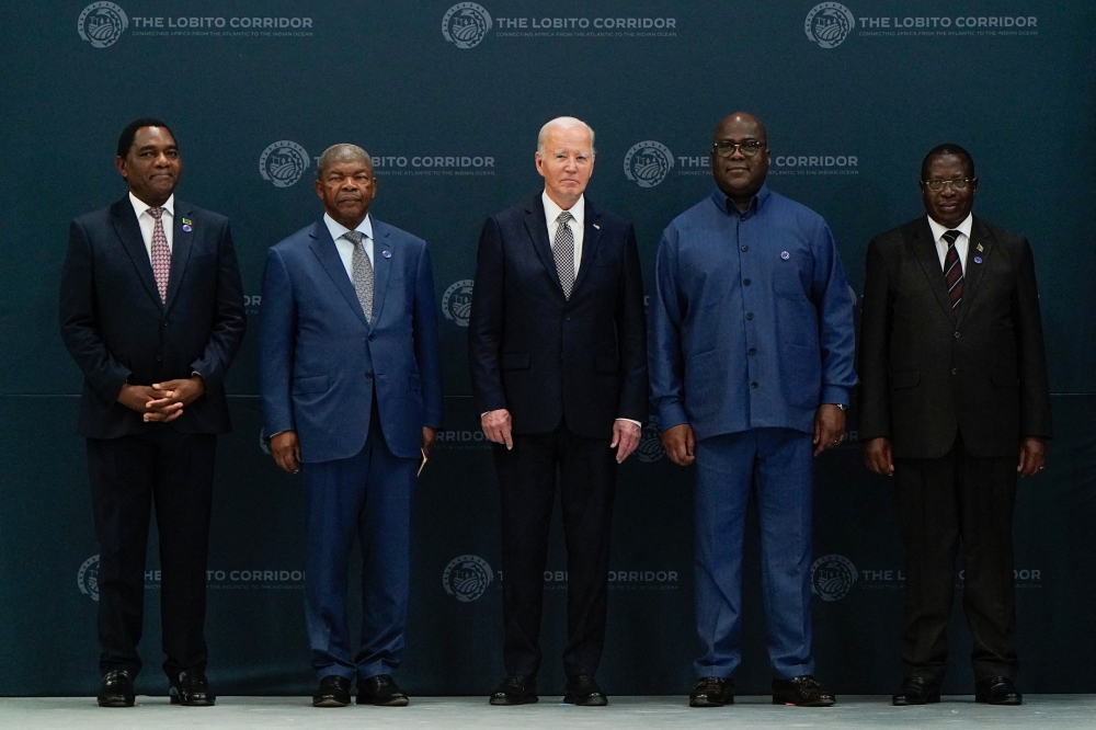 US President Joe Biden(C) pose with African leaders, during a tour of a Carrinho facility, near Lobito, Angola. — Reuters