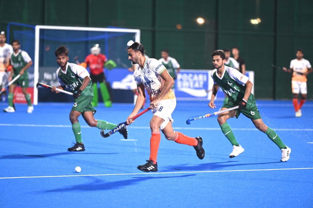 India and Pakistan players fight for the ball during the Men's Junior Asia Cup in Muscat.