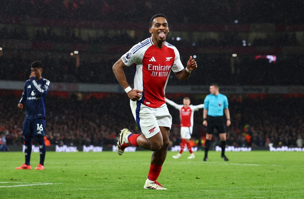 Soccer Football - Premier League - Arsenal v Manchester United - Emirates Stadium, London, Britain - December 4, 2024 Arsenal's Jurrien Timber celebrates scoring their first goal Action Images via Reuters