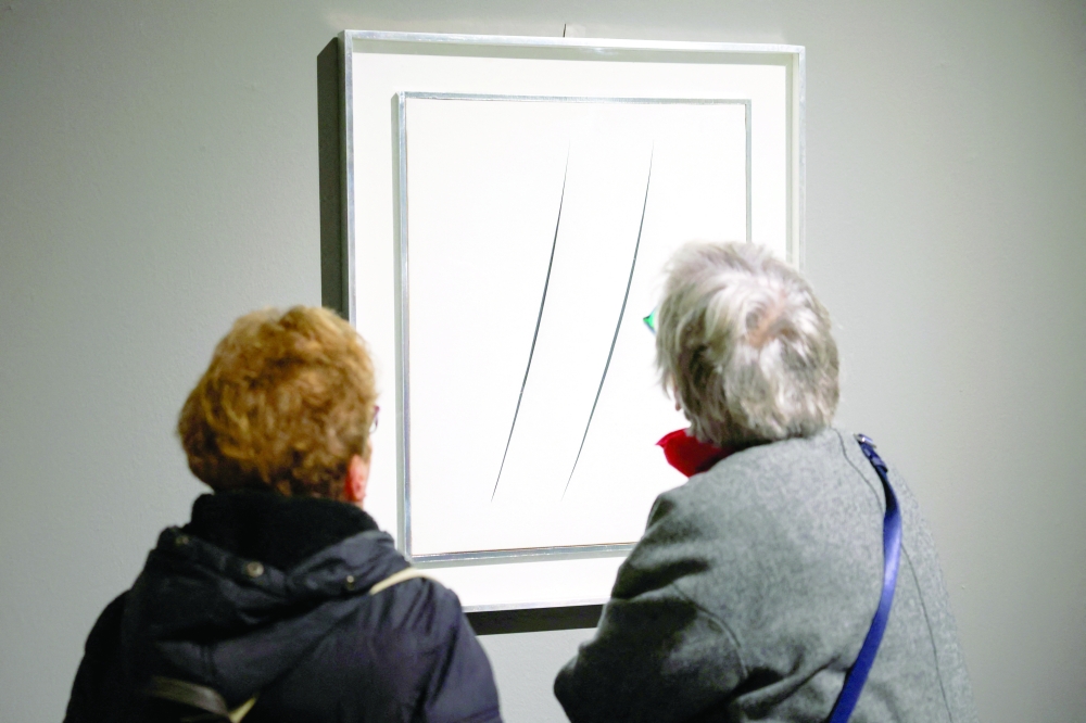 Dali, Warhol and other seized mafia art on display in Milan