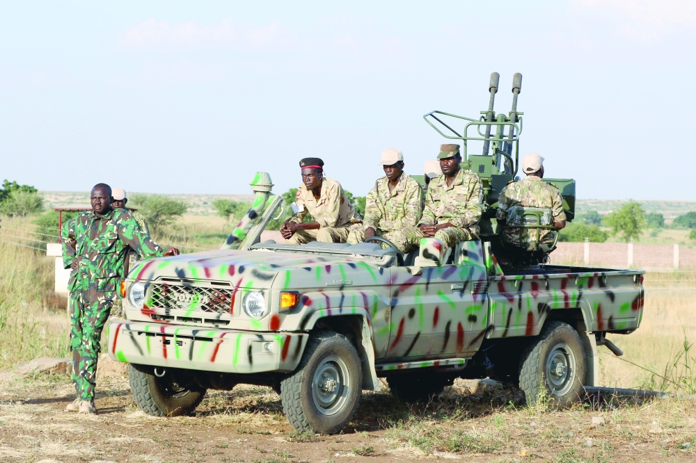 Members of Sudan's armed forces appear for new recruits in the eastern city of Gedaref. — AFP