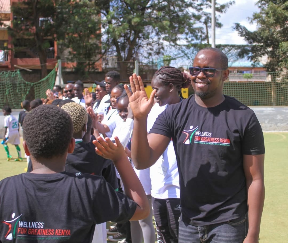 Team spirit in action as Wellness for Greatness Kenya facilitators foster unity and joy during afun-filled activity