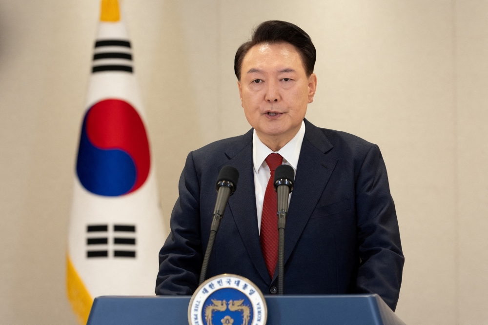 South Korean President Yoon Suk Yeol delivers an address to the nation at the Presidential Office in Seoul, South Korea, December 12, 2024.   The Presidential Office/Handout via REUTERS   ATTENTION EDITORS - THIS IMAGE HAS BEEN SUPPLIED BY A THIRD PARTY.