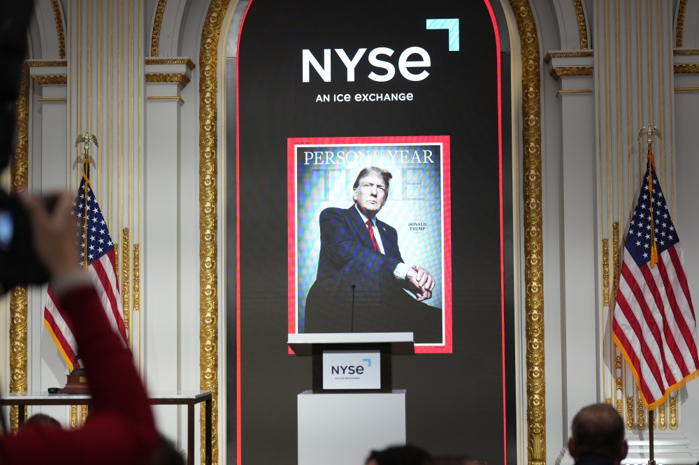 A sign announces President-elect Donald Trumps selection as Time magazines Person of the Year, before he was to ring the bell to open trading at the New York Stock Exchange in Manhattan on Thursday, Dec. 12, 2024. (Doug Mills/The New York Times)