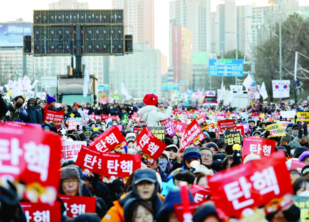 Protesters participate in a rally against South Korean President Yoon Suk Yeol, in front of the National Assembly in Seoul. — Reuters