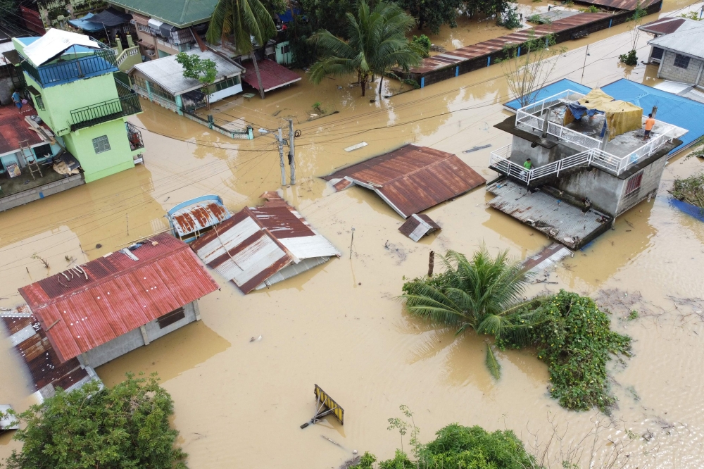 An aerial view shows submerged homes in a village in Philippines 