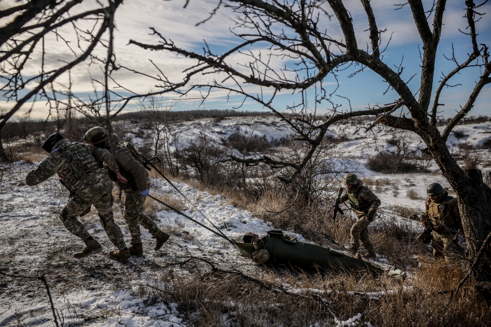 Servicemen of the Ukrainian Armed Forces take part in a tactical medicine exercise, in Donetsk region, Ukraine. — Reuters 