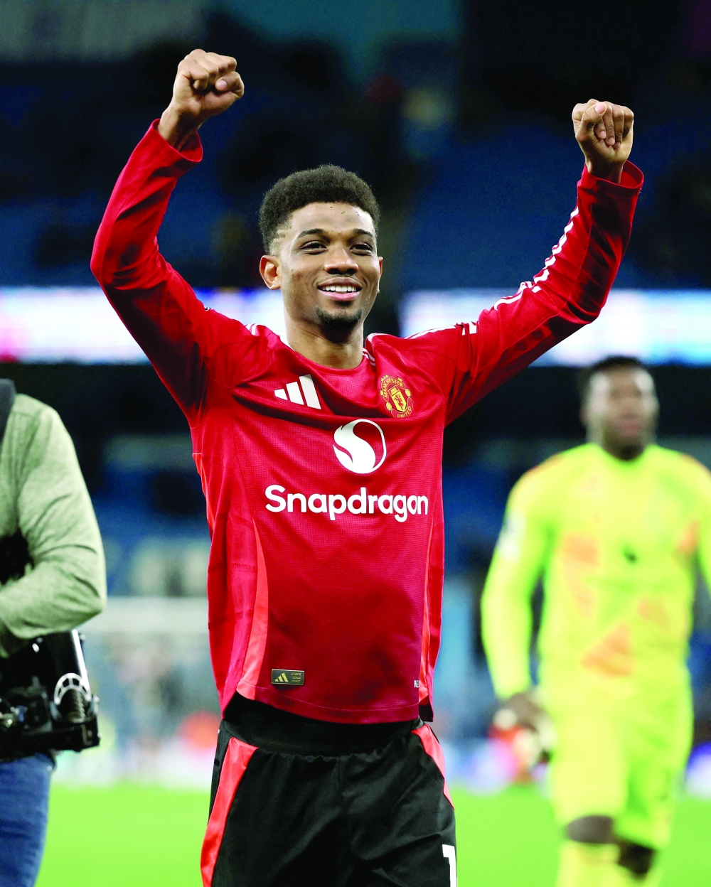 Manchester United's Amad Diallo celebrates after the match REUTERS
