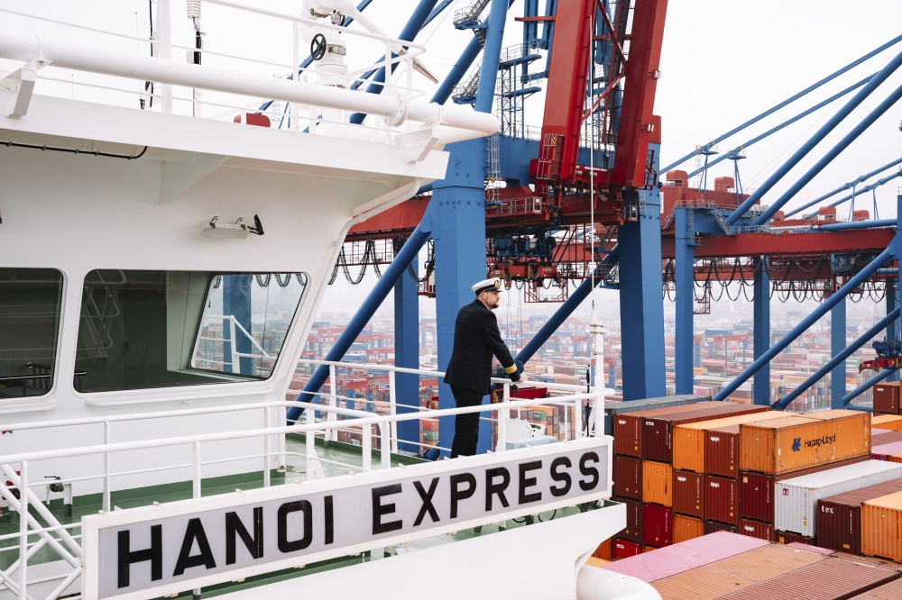 **EMBARGO: No electronic distribution, Web posting or street sales before WEDNESDAY 12:01 A.M. ET, DEC. 11, 2024. No exceptions for any reasons. EMBARGO set by source.** Capt. Tobias Kammann on his freighter, the Hanoi Express, docked in Hamburg, Germany, on Nov. 10, 2024. (Patrick Junker/The New York Times)