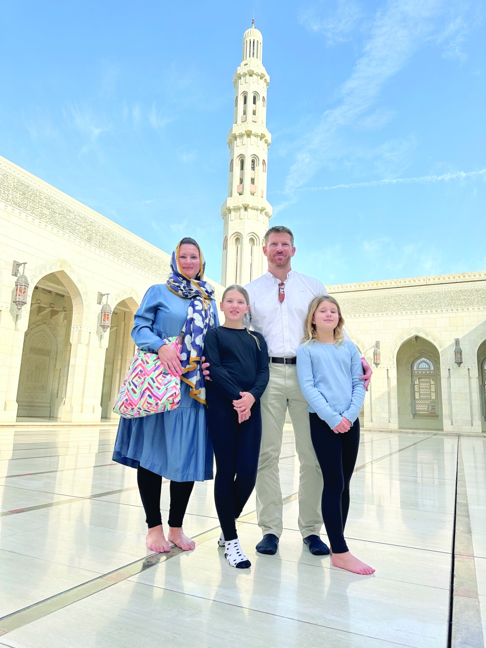 Claire Hall and her family at the Sultan Qaboos Grand Mosque