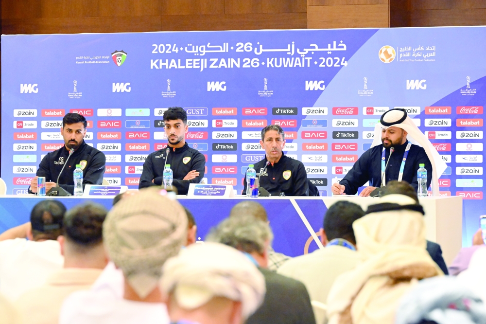 Oman head coach Rasheed Jaber and player Mohammed al Musallami attend the press conference. — Hussain Al Maqbali